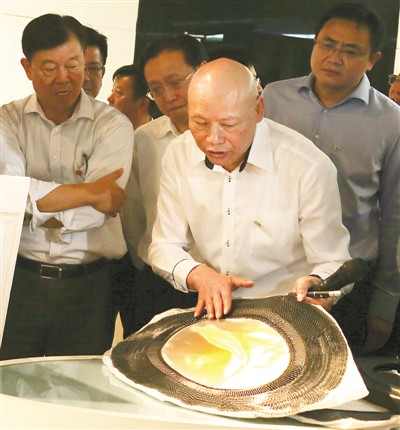 今日《人民日报》9版头条追记钱云宝:一个党员企业家的报国梦