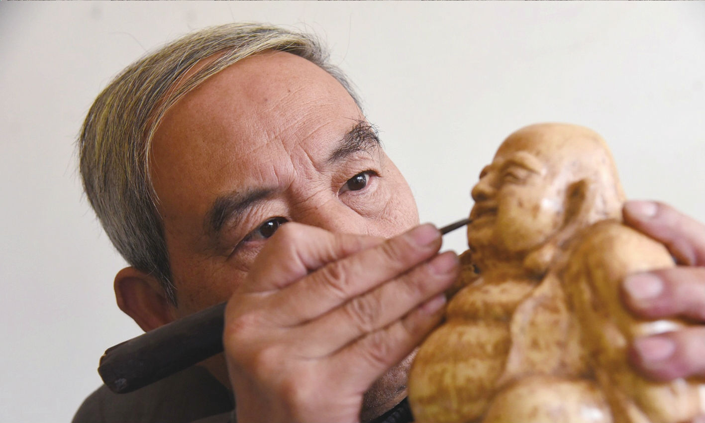 朱正平:从修表匠到木雕非遗传承人