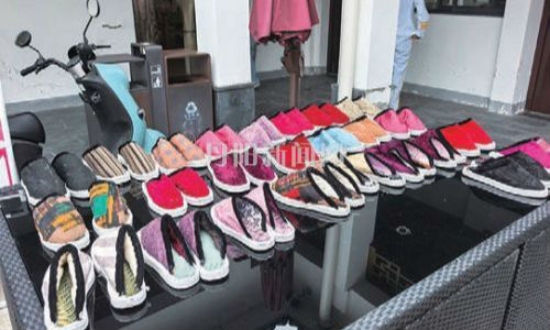 千双手工棉鞋表达“感恩的心”