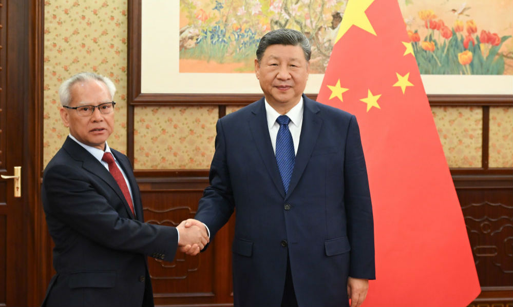 习近平听取岑浩辉述职报告