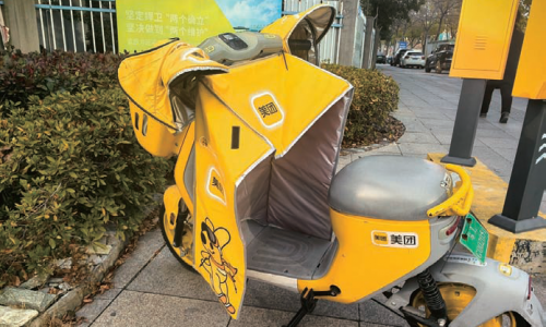 寒冬暖行！美团共享电单车“过冬装备”上新