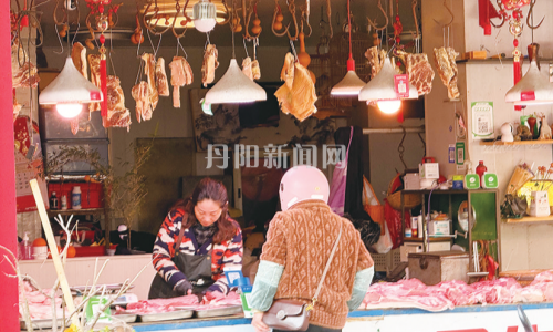 猪肉价格大幅回落 市民餐桌“肉香更浓”