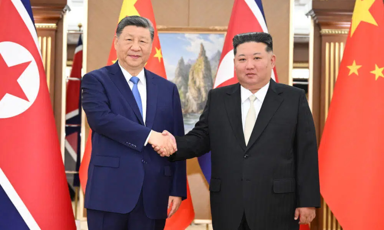 习近平同金正恩举行会谈