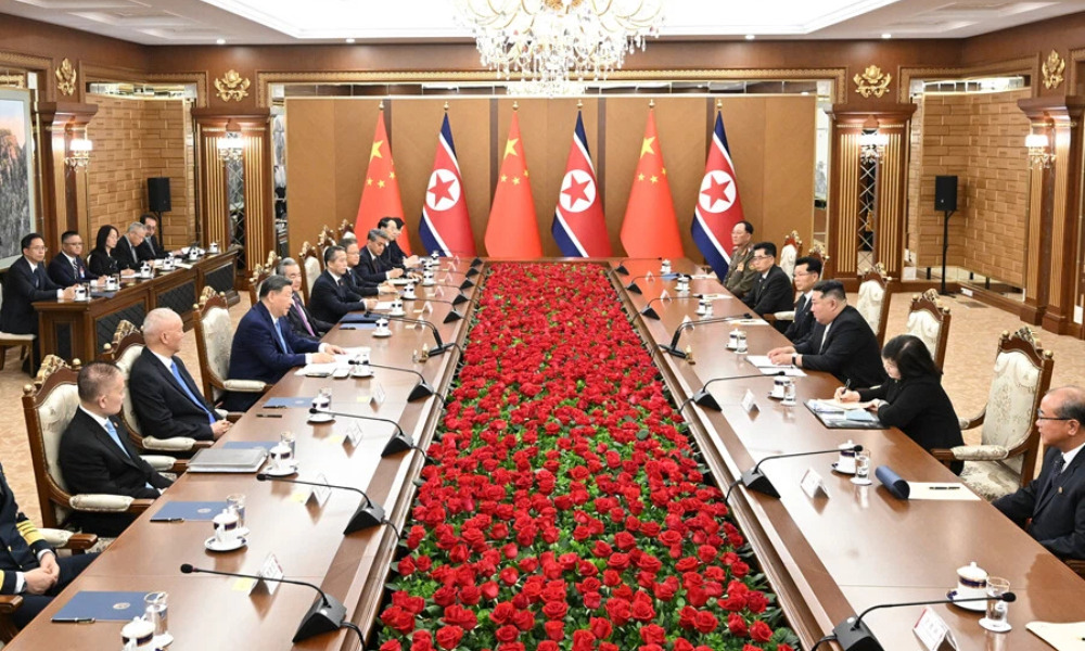 习近平同金正恩举行会谈